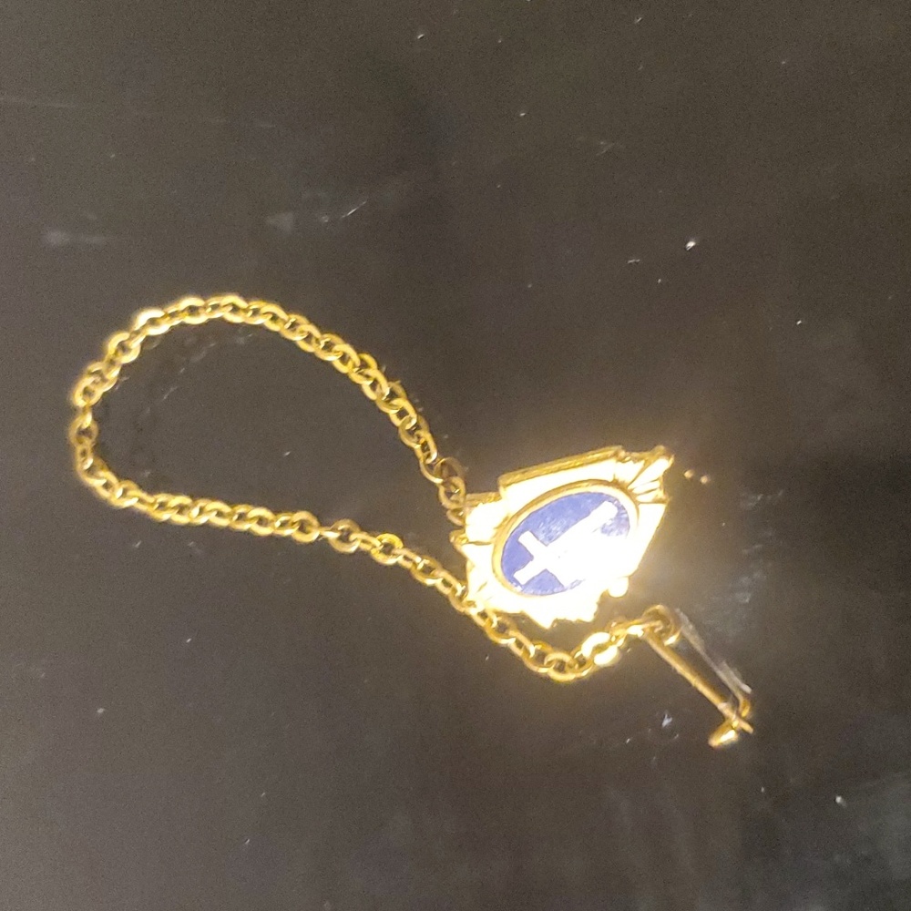 Religious pin